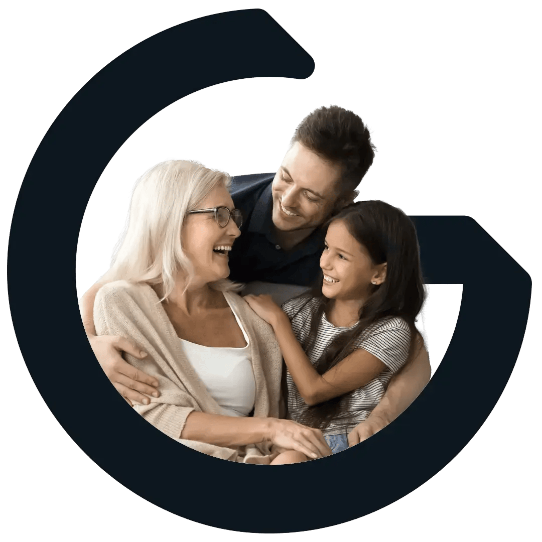 Grandmother, son, and granddaughter looking and smiling at each other.