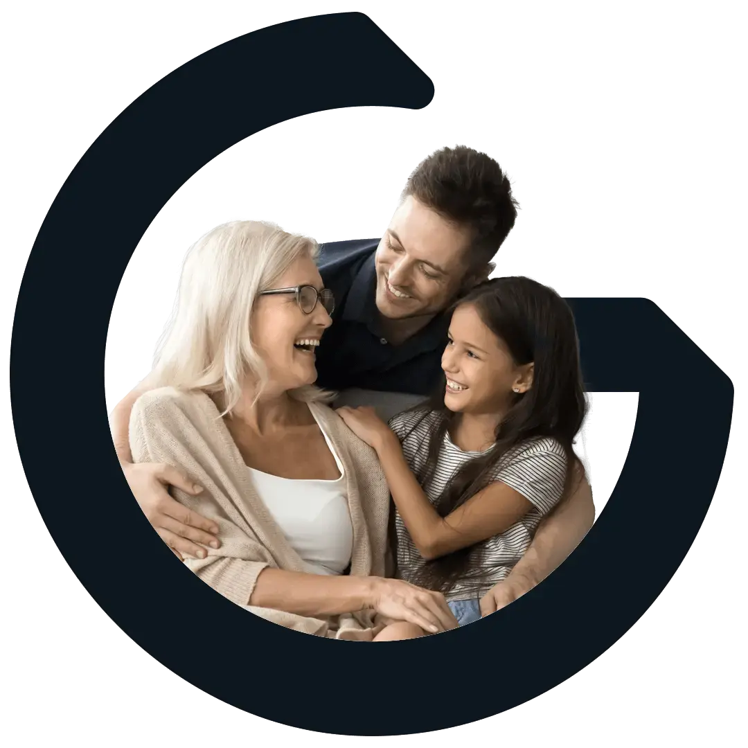 Grandmother, son, and granddaughter looking and smiling at each other.